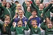 23 June 2009; Ulster Bank GAA stars Kieran Donaghy, Kerry, and Finian Hanley, Galway, welcomed pupils from schools to Croke Park as part of the Ulster Bank/Irish News competition where 5 lucky classes won a school trip of a lifetime which included a tour of the famous Croke Park stadium while also meeting some of the biggest GAA stars in the country. Pictured are Kieran, left, and Finian with pupils from Barnish Primary School, Ballycastle, Co. Antrim. Croke Park, Dublin. Picture credit: Brian Lawless / SPORTSFILE  *** Local Caption ***