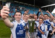 25 October 2015; Claremorris captain Colin Gill takes a 'selfie' as they celebrate after the cup presentation. JJ Burke Renault Minor A Football Championship Final, Claremorris v Ballina Stephenites. Elverys MacHale Park, Castlebar, Co. Mayo. Picture credit: David Maher / SPORTSFILE