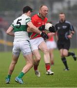 25 October 2015; Paul Reid, Palatine, in action against Paul Cotter, Portlaoise. AIB Leinster GAA Senior Club Football Championship, Palatine v Portlaoise. Netwatch Dr. Cullen Park, Carlow. Photo by Sportsfile