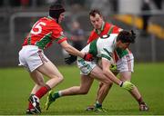 25 October 2015; David Seale, Portlaoise, in action against Brian Kelly, left, and Jamie Kenny, Palatine. AIB Leinster GAA Senior Club Football Championship, Palatine v Portlaoise. Netwatch Dr. Cullen Park, Carlow. Photo by Sportsfile
