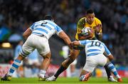 25 October 2015; Israel Folau, Australia, is tackled by Nicolas Sanchez, right, and Agustin Creevy, Argentina. 2015 Rugby World Cup, Semi-Final, Argentina v Australia. Twickenham Stadium, Twickenham, London, England. Picture credit: Ramsey Cardy / SPORTSFILE