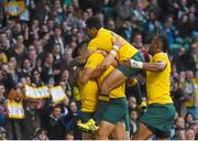 25 October 2015; Adam Ashley-Cooper, Australia, is congratulated by team-mates after scoring his side's second try of the game. 2015 Rugby World Cup, Semi-Final, Argentina v Australia. Twickenham Stadium, Twickenham, London, England. Picture credit: Ramsey Cardy / SPORTSFILE