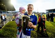 25 October 2015; Lar Corbett, Thurles Sarsfields, and his daughter Faye with the cup following his side's victory. Tipperary County Senior Hurling Championship Final, Thurles Sarsfields v Nenagh Éire Óg. Semple Stadium, Thurles, Co. Tipperary. Picture credit: Stephen McCarthy / SPORTSFILE