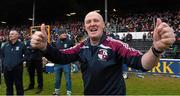 25 October 2015; The Clara manager Mick Purcell celebrates after the final whistle. The O'Loughlin Gaels manager Aidan Fogarty is to the extreme left. St. Canice's Credit Union Kilkenny County Senior Hurling Championship Final, Clara v O'Loughlin Gaels. Nowlan Park, Kilkenny. Picture credit: Ray McManus / SPORTSFILE