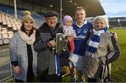 25 October 2015; Lar Corbett, Thurles Sarsfields, with, from left, wife Elaine, uncle Fr. Larry Wrenn, daughter Faye and mother Breda following their victory. Tipperary County Senior Hurling Championship Final, Thurles Sarsfields v Nenagh Éire Óg. Semple Stadium, Thurles, Co. Tipperary. Picture credit: Stephen McCarthy / SPORTSFILE