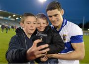 25 October 2015; Diarmuid Connolly, St Vincents, poses with supporters Dylan O'Toole, age 11, and brother Karl O'Toole, age 5, from Finglas, Co. Dublin after the match. Dublin Senior Football Championship, Semi-Final, St Vincents v Na Fianna, Parnell Park, Donnycarney, Dublin. Picture credit: Cody Glenn / SPORTSFILE