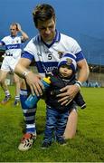 25 October 2015; Brendan Egan, St Vincents, with his son 14-month-old Albie after the victory. Dublin Senior Football Championship, Semi-Final, St Vincents v Na Fianna, Parnell Park, Donnycarney, Dublin. Picture credit: Cody Glenn / SPORTSFILE