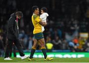 25 October 2015; Australia's Will Genia with daughter Olivia following his side's victory. 2015 Rugby World Cup, Semi-Final, Argentina v Australia. Twickenham Stadium, Twickenham, London, England. Picture credit: Ramsey Cardy / SPORTSFILE