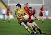 27 June 2009; Cathal Ellis, Donegal, in action against Chris Clarke, Down. ESB Ulster Minor Football Championship Semi-Final, Donegal v Down, St. Tighearnach's Park, Clones, Co. Monaghan. Picture credit: Oliver McVeigh / SPORTSFILE *** Local Caption ***