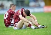 28 June 2009; Galway players Jonathan Duane, right, and Cathal Sweeney, show their disappointment after defeat to Mayo. ESB Connacht Minor Football Championship Semi-Final, Mayo v Galway, Markievicz Park, Sligo. Picture credit: Brian Lawless / SPORTSFILE