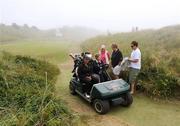 28 June 2009; Players come off the course after play was suspended due to fog during the final round of the AIB Ladies Irish Open. Portmarnock Hotel and Golf Links, Portmarnock, Co. Dublin. Photo by Sportsfile *** Local Caption ***