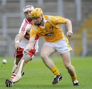 28 June 2009; Christopher McGuinness, Anrtrim, in action against Mickey McGlade, Derry. ESB Ulster Minor Hurling Championship Final, Anrtrim v Derry, Casement Park, Belfast, Co. Antrim. Picture credit: Oliver McVeigh / SPORTSFILE