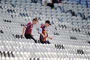 28 June 2009; Young Westmeath fans make their way to their seats ahead of the game. GAA Football Leinster Senior Championship Semi-Final, Westmeath v Dublin, Croke Park, Dublin. Picture credit: Stephen McCarthy / SPORTSFILE