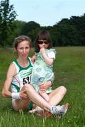 27 June 2009; Olive Loughnane, Ireland, with her three-year-old daughter Emer, after winning the Women's 20K walk race. Dublin Grand Prix of Race Walking. Phoenix Park, Dublin. Picture credit: Tomas Greally / SPORTSFILE