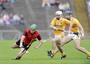 28 June 2009; Ruari McGrattan, Down, in action against Shane McNaughton and Cormac Donnelly, Anrtrim. GAA Hurling Ulster Senior Championship Final, Antrim v Down, Casement Park, Belfast, Co. Antrim. Picture credit: Oliver McVeigh / SPORTSFILE *** Local Caption ***