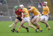 28 June 2009; Ruari McGrattan, Down, in action against Shane McNaughton and Cormac Donnelly, Anrtrim. GAA Hurling Ulster Senior Championship Final, Antrim v Down, Casement Park, Belfast, Co. Antrim. Picture credit: Oliver McVeigh / SPORTSFILE *** Local Caption ***