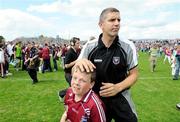 28 June 2009; Sligo manager Kevin Walsh signs an autograph for a young Galway supporter after the game. GAA Football Connacht Senior Championship Semi-Final, Sligo v Galway, Markievicz Park, Sligo. Picture credit: Ray Ryan / SPORTSFILE