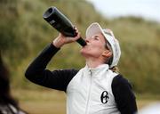 28 June 2009; Italy's Diana Luna has a celebratory drink after winning the AIB Ladies Irish Open. Portmarnock Hotel and Golf Links, Portmarnock, Co. Dublin. Photo by Sportsfile *** Local Caption ***