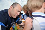 25 June 2009; Dublin manager Anthony Daly signs autographs during a media night ahead of their Leinster GAA Hurling Senior Championship Final against Kilkenny in Croke Park on Sunday the 5th of July. Parnell Park, Dublin. Picture credit: Brian Lawless / SPORTSFILE