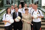29 June 2009; Caitríona Ruane, Northern Ireland Minister of Education, with Tom Daly, Ulster Council GAA President, and Ulster GAA Coaches in Down, during a visit to Woodhall Kilrea. Woodhall Residential Centre, Kilrea, Co. Derry. Picture credit: Oliver McVeigh / SPORTSFILE  *** Local Caption ***