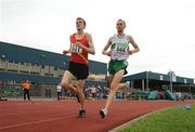 28 June 2009; Simon Ryan, Raheny Shamrocks AC, 566, who won the U23 Men's 5,000m final in action against James O'Hare who won the Junior Men's 5,000m final event at the AAI Woodies DIY Junior & U23 Track & Field Championships, Tullamore, Co. Offaly. Picture credit: Pat Murphy / SPORTSFILE