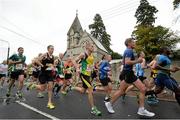 26 October 2015; Runners make their way along Temple Oak Road during the SSE Airtricity Dublin Marathon 2015,  Dublin. Picture credit: Cody Glenn / SPORTSFILE