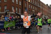 26 October 2015; Dino Turco, The Netherlands, nears the finish line during the SSE Airtricity Dublin Marathon 2015, Merrion Square, Dublin.Picture credit: Ray McManus / SPORTSFILE