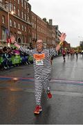 26 October 2015; Danoli Flood, Co. Kidlare, nears the finish during the SSE Airtricity Dublin Marathon 2015, Merrion Square, Dublin.Picture credit: Ray McManus / SPORTSFILE
