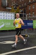 26 October 2015; GAA referee Johnny Sexton, from North Cork AC, on his way to finishing the SSE Airtricity Dublin Marathon 2015, Merrion Square, Dublin.Picture credit: Ray McManus / SPORTSFILE
