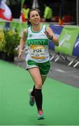 26 October 2015; Lorraine Byrne, Raheny Shamrock AC, Dublin, on her way to finishing the SSE Airtricity Dublin Marathon 2015, Merrion Square, Dublin. Picture credit: Tomas Greally / SPORTSFILE
