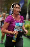 26 October 2015; Ann Maria  McAuley, Ireland,  on her way to finishing the SSE Airtricity Dublin Marathon 2015, Merrion Square, Dublin. Picture credit: Tomas Greally / SPORTSFILE