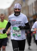 26 October 2015; Giuseppe Ignazio Canali, from Italy,  on his way to finishing the SSE Airtricity Dublin Marathon 2015, Merrion Square, Dublin. Picture credit: Tomas Greally / SPORTSFILE