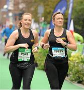 26 October 2015; Tracy Lawton and Deborah Terras, from England, on their way to finish the SSE Airtricity Dublin Marathon 2015, Merrion Square, Dublin. Picture credit: Tomas Greally / SPORTSFILE