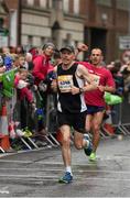 26 October 2015; Eugene McCarthy, from Co. Cork, on his way to finishing the SSE Airtricity Dublin Marathon 2015, Merrion Square, Dublin.Picture credit: Ray McManus / SPORTSFILE
