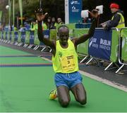 26 October 2015; Daniel Tanui, Kenya, celebrates after crossing the finish line at the SSE Airtricity Dublin Marathon 2015, Merrion Square, Dublin. Picture credit: Seb Daly / SPORTSFILE