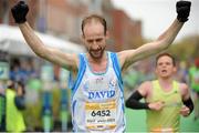 26 October 2015; Dave Carrie, Team Carrie, Dunleer, Co. Louth, on his way to finish the SSE Airtricity Dublin Marathon 2015, Merrion Square, Dublin. Picture credit: Tomas Greally / SPORTSFILE