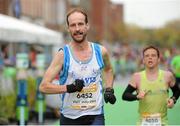 26 October 2015; Dave Carrie, Team Carrie, Dunleer, Co. Louth, on his way to finish the SSE Airtricity Dublin Marathon 2015, Merrion Square, Dublin. Picture credit: Tomas Greally / SPORTSFILE