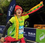 26 October 2015; Jurgita Ramanauskaite, from Lithuania, on her way to finishing the SSE Airtricity Dublin Marathon 2015, Merrion Square, Dublin. Picture credit: Tomas Greally / SPORTSFILE