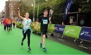 26 October 2015; Trea Grant and Conchur White, both from Co. Armagh, on their way to finishing the SSE Airtricity Dublin Marathon 2015, Merrion Square, Dublin. Picture credit: Tomas Greally / SPORTSFILE