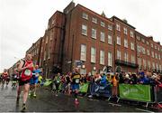 26 October 2015; A general view of competitors,  on their way to finish the SSE Airtricity Dublin Marathon 2015, Merrion Square, Dublin. Picture credit: Tomas Greally / SPORTSFILE