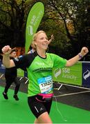 26 October 2015; Fiona Kenna, from Dublin, on her way to finishing the SSE Airtricity Dublin Marathon 2015, Merrion Square, Dublin. Picture credit: Tomas Greally / SPORTSFILE
