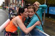 26 October 2015; Sinead and Ciara Galvin, from Roscommon, during the Dublin City Marathon. SSE Airtricity Dublin City Marathon. Dublin. Picture credit: Ray McManus / SPORTSFILE