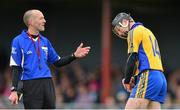 25 October 2015; Niall Gilligan, Sixmilebridge, in conversation with referee Cathal McAllister after picking up an injury. AIB Munster GAA Senior Club Hurling Championship, Sixmilebridge v Na Piarsaigh. O'Garney Park, Sixmilebridge, Co. Clare. Picture credit: Piaras Ó Mídheach / SPORTSFILE