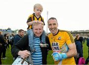 11 October 2015; Paul Hearty, Crossmaglen Rangers captain, along with former Crossmaglen and Armagh team mate Francie Bellew, after the game. Armagh County Senior Football Championship Final, Crossmaglen Rangers v Armagh Harps. Athletic Grounds, Armagh. Picture credit: Oliver McVeigh / SPORTSFILE