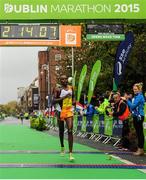26 October 2015; Francis Ngare, Kenya, crosses the line to finish in second place at the SSE Airtricity Dublin Marathon 2015. Merrion Square, Dublin. Picture credit: Tomas Greally / SPORTSFILE