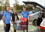 29 October 2015; Dublin footballers Jonny Cooper and Paddy Andrews with Roisin Daly from Kinsealy, Co. Dublin, who were in SuperValu, Knocklyon, today to launch SuperValu’s new Car and Home Insurance offering in partnership with AIG Insurance. The grocery retailer offers its loyal customers discounted rates for Car and Home Insurance with many great benefits such as breakdown assist as standard to help them get more out of life for less. The decision to offer insurance follows feedback from SuperValu’s 2.6 million weekly customers, that it was one of a number of services they would like to see offered by the grocery retailer. For more information on SuperValu Car and Home Insurance products log on to www.supervalu.ie/insurance. Supervalu, Knocklyon Road, Templeogue, Dublin. Picture credit: Matt Browne / SPORTSFILE