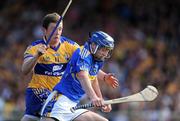 21 June 2009; Paddy Stapleton, Tipperary, in action against Diarmuid McMahon, Clare. GAA Hurling Munster Senior Championship Semi-Final, Tipperary v Clare, Gaelic Grounds, Limerick. Picture credit: Brendan Moran / SPORTSFILE