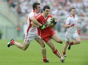 21 June 2009; Kevin McGuckin, Derry, in action against Joe McMahon, Tyrone. GAA Football Ulster Senior Championship Semi-Final, Tyrone v Derry, Casement Park, Belfast, Co. Antrim. Picture credit: Oliver McVeigh / SPORTSFILE