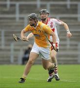 28 June 2009; Matthew Donnelly, Antrim, in action against Gavin O'Neill, Derry. ESB Ulster Minor Hurling Championship Final, Anrtrim v Derry, Casement Park, Belfast, Co. Antrim. Picture credit: Oliver McVeigh / SPORTSFILE