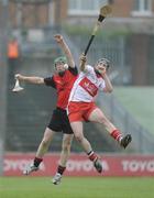 21 June 2009; Karl McKaigue, Derry, in action against Cormac Flynn, Down. Ulster Minor Hurling Championship Semi-Final, Derry v Down, Casement Park, Belfast, Co. Antrim. Picture credit: Oliver McVeigh / SPORTSFILE